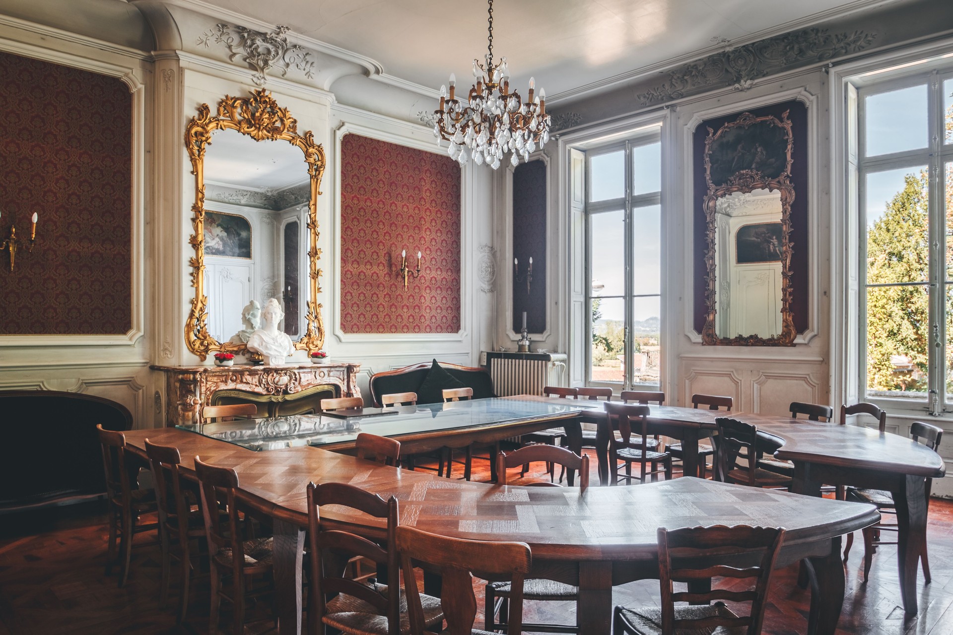 Ambronay ancient town hall meeting room with large windows
